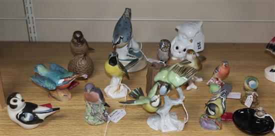 A collection of fourteen mixed bird ornaments including Beswick